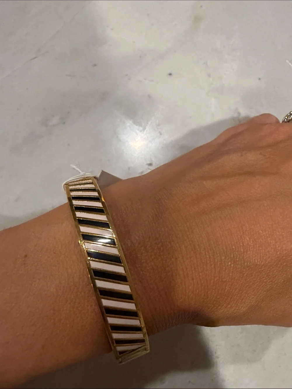 Gold-Tone Black and White Striped Bangle Bracelet